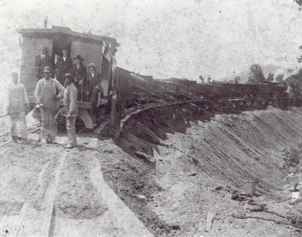 Durham Railroad Workers doing fill work on trestle